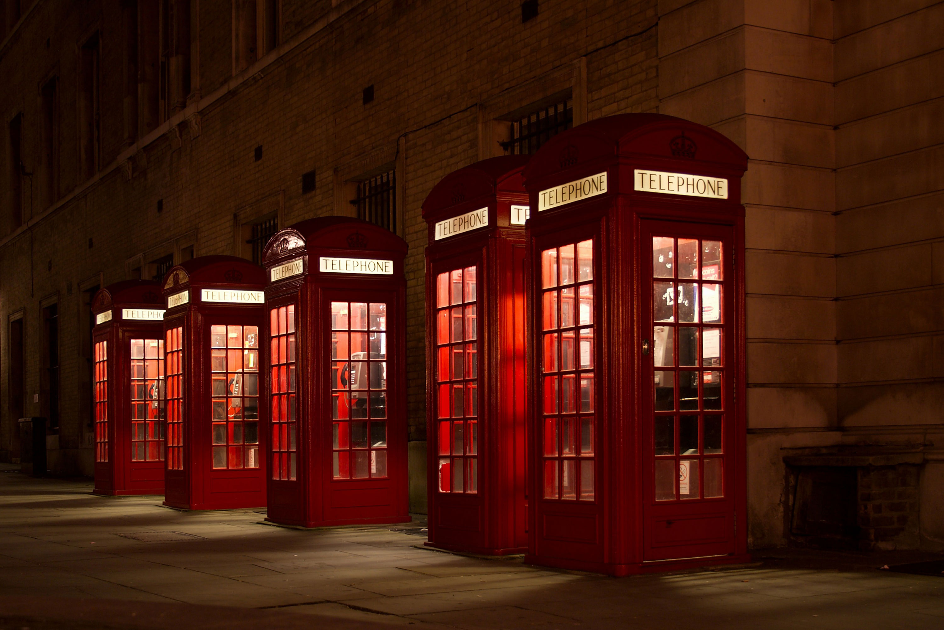 Row of red telephone boxes